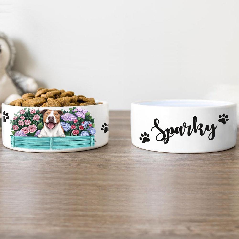 Dog pet bowl with flower garden background