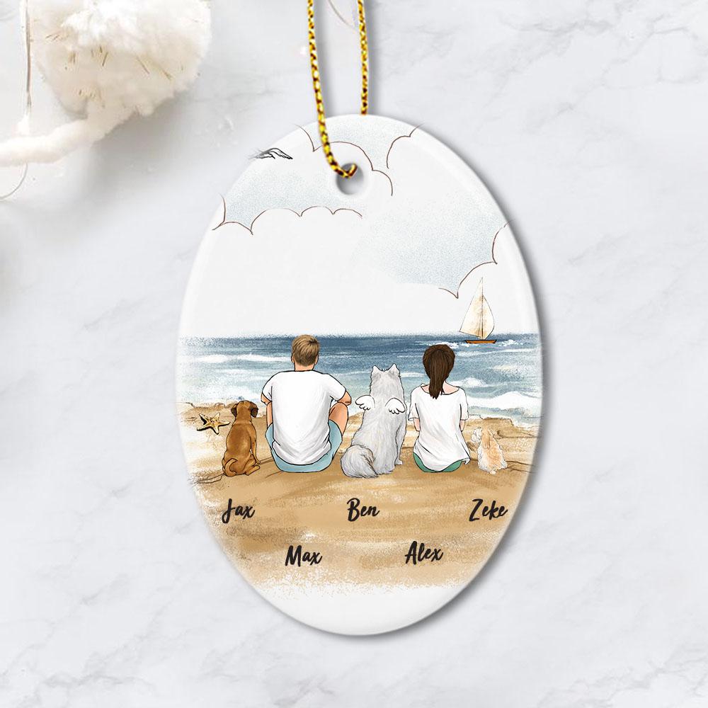 dog and dog owner sitting on beach oval ornament gift for dog lovers