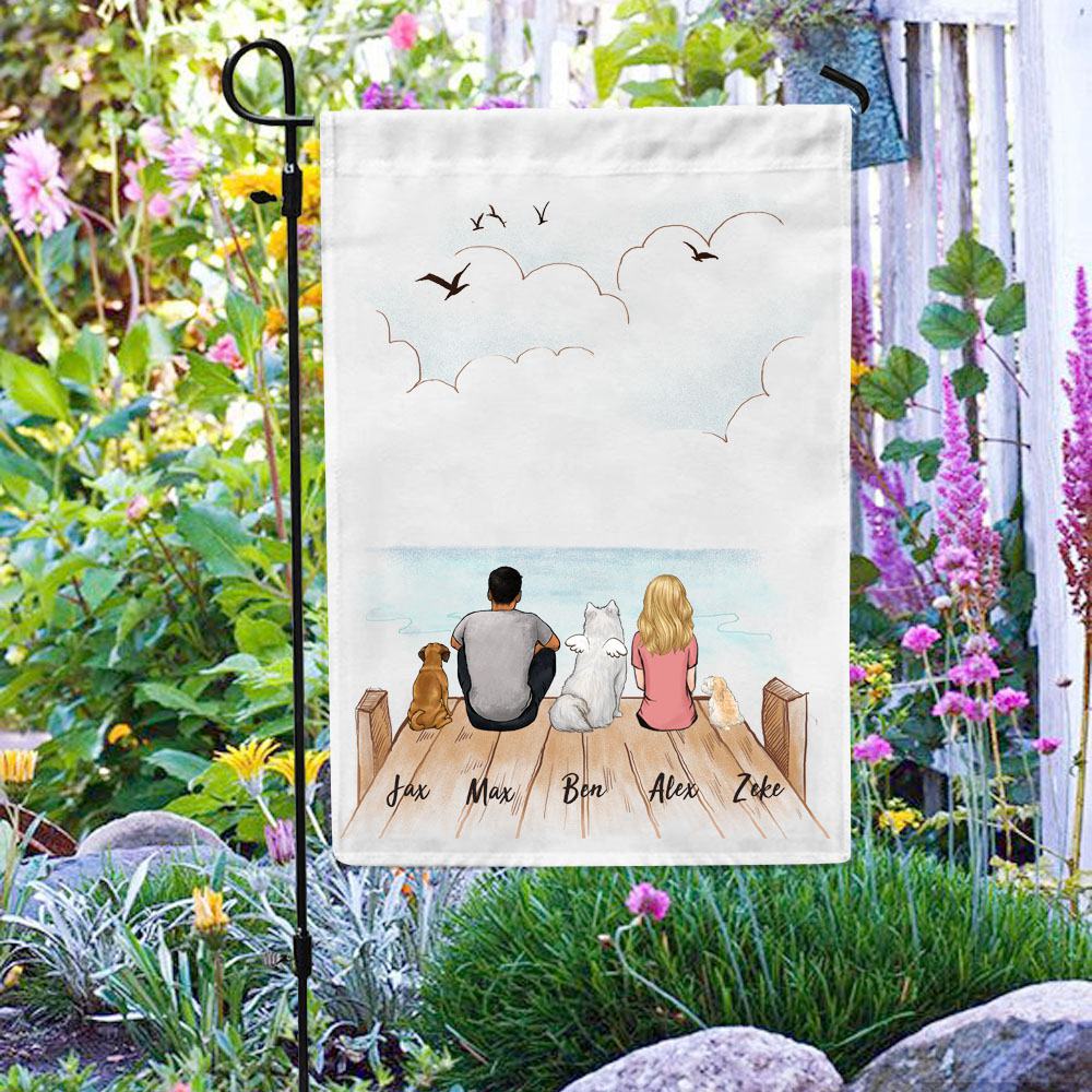 dog and dog owner sitting on wooden dock garden flag gift for dog lovers