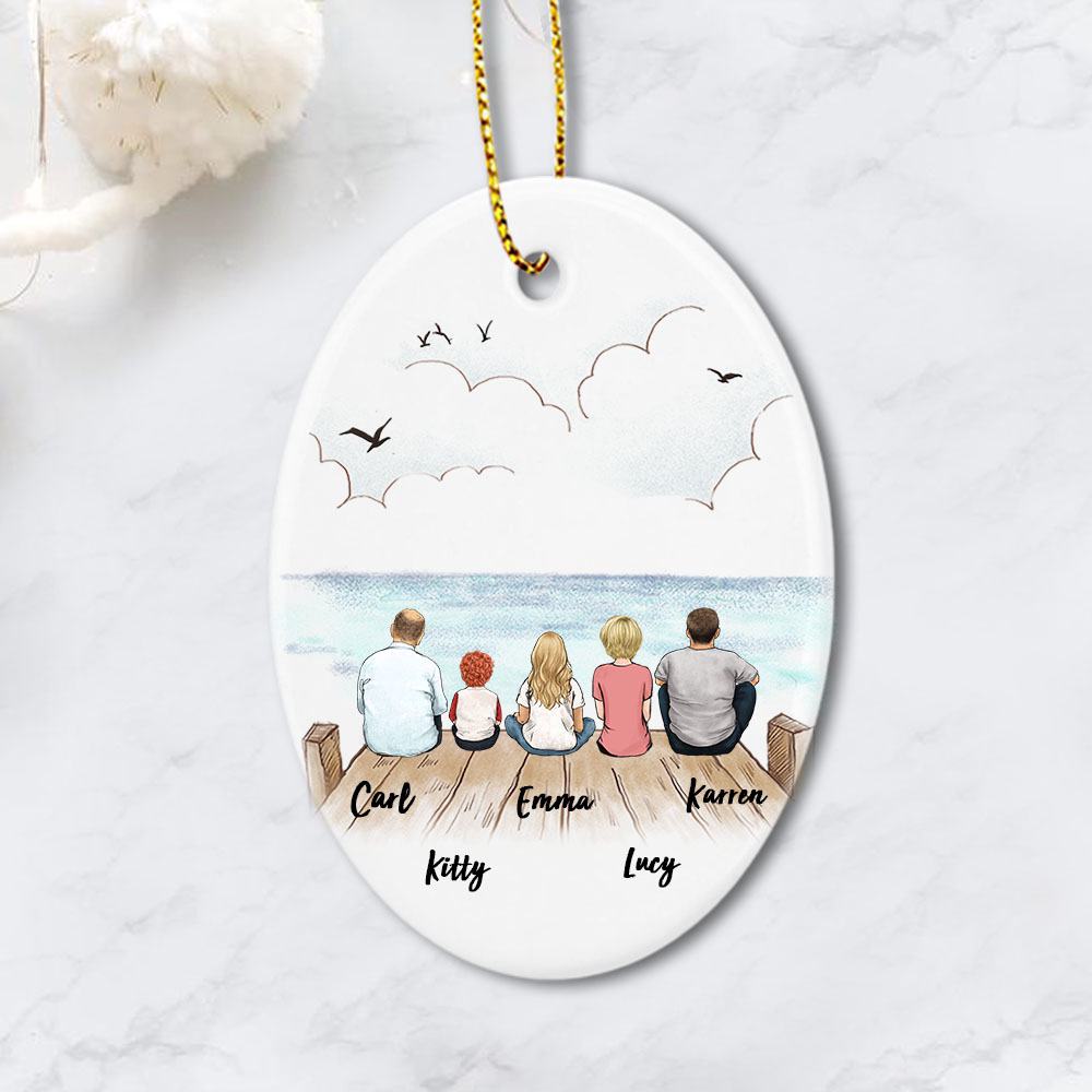 oval ornament gift for the whole family with up to 5 members sitting on wooden dock